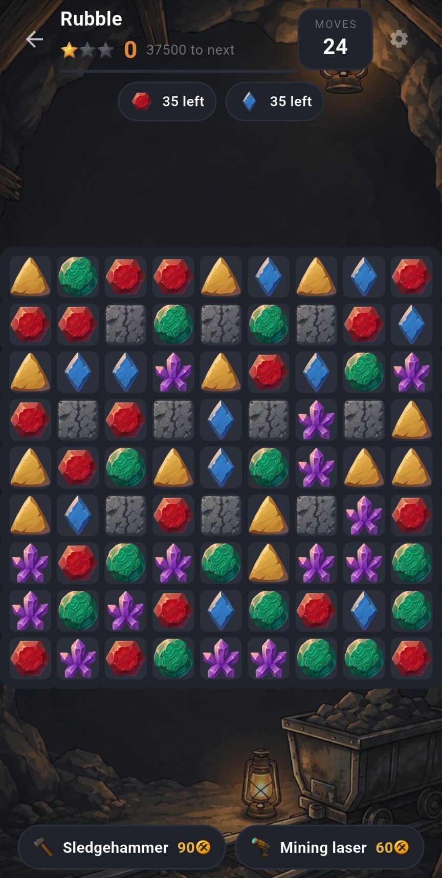 Rubble level: a full board of gem boulders and cracked stone blockers